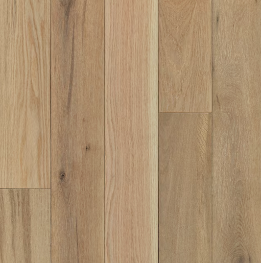 Light - toned oak flooring with natural wood grain and subtle knots, embodying a warm and rustic aesthetic.