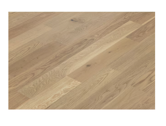 Light - hued oak flooring with distinct natural wood grain patterns, exuding a warm and inviting ambiance.